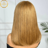 Back view of EMMA Honey Blonde Wig showing silky straight strands and chic fringe