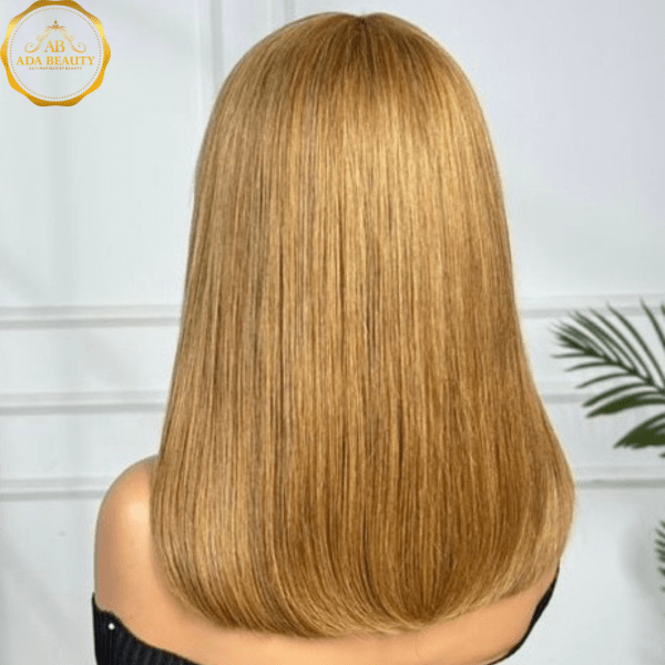 Back view of EMMA Honey Blonde Wig showing silky straight strands and chic fringe