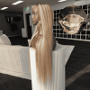 Lauren caramel blonde highlights frontal wig showing adjustable elastic band and straps for a secure, glueless hold