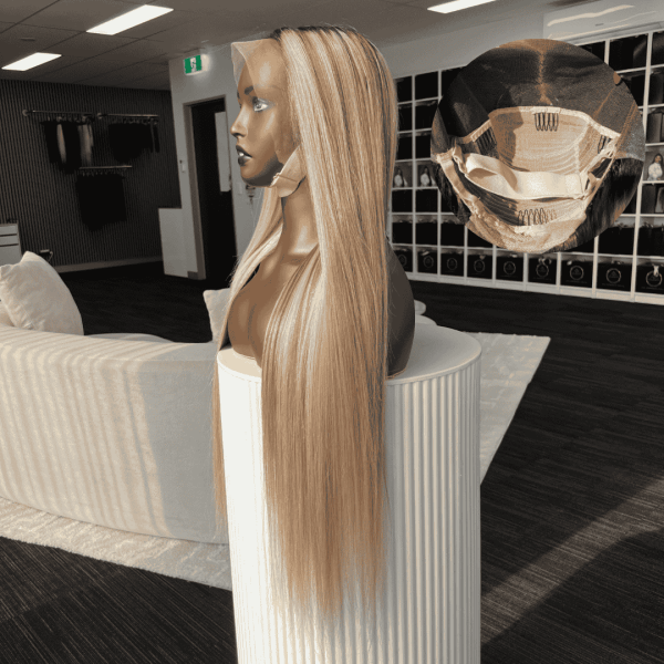 Lauren caramel blonde highlights frontal wig showing adjustable elastic band and straps for a secure, glueless hold