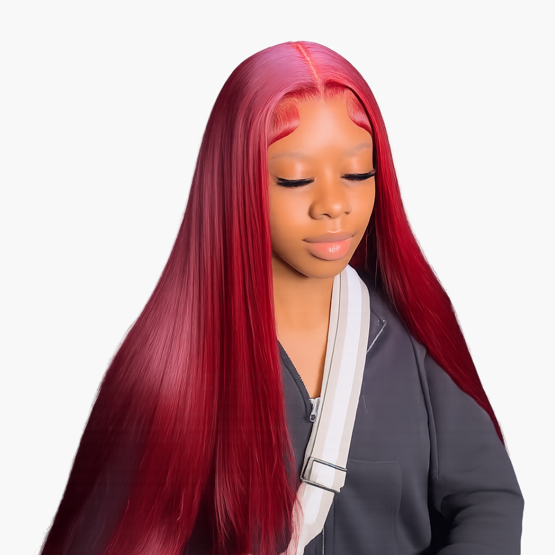 Young woman with long gradient pink red hair eyes closed wearing a gray jacket and white shoulder strap bag